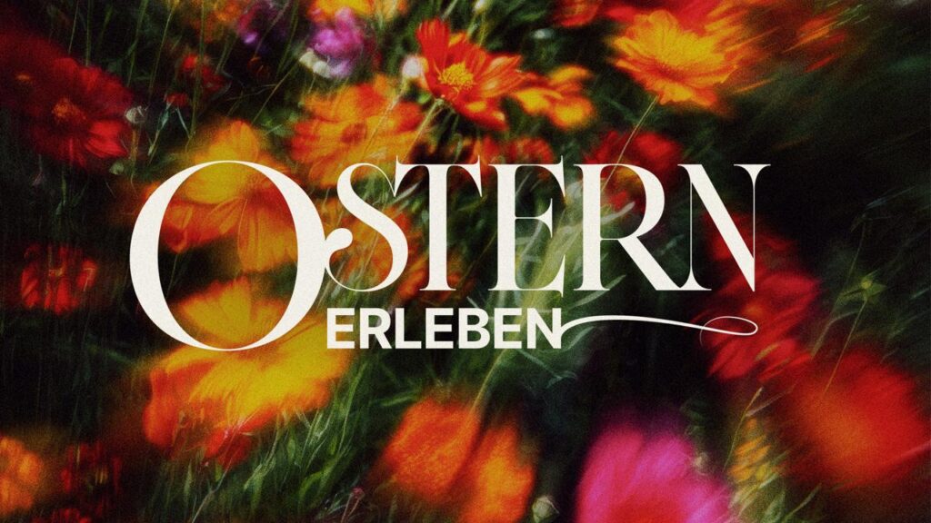 Bunte Blumen im Garten mit Text "Ostern erleben".